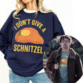 I Don’t Give a Schnitzel Sweatshirt – Funny Christmas product image 1